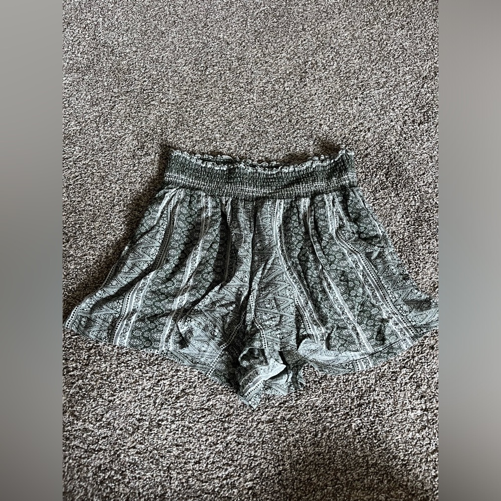 Green and white patterned shorts
